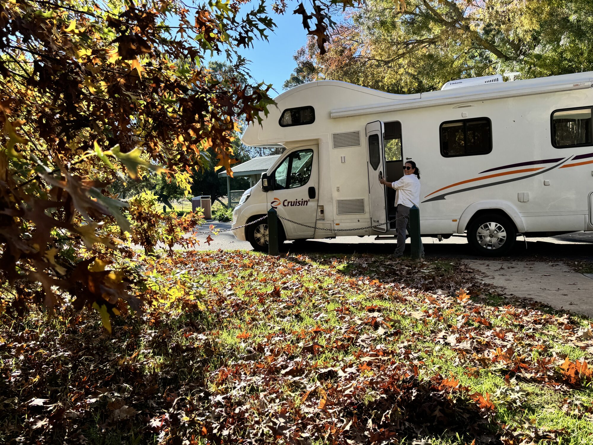 Traveling by motorhome through Australia with children among autumn landscapes